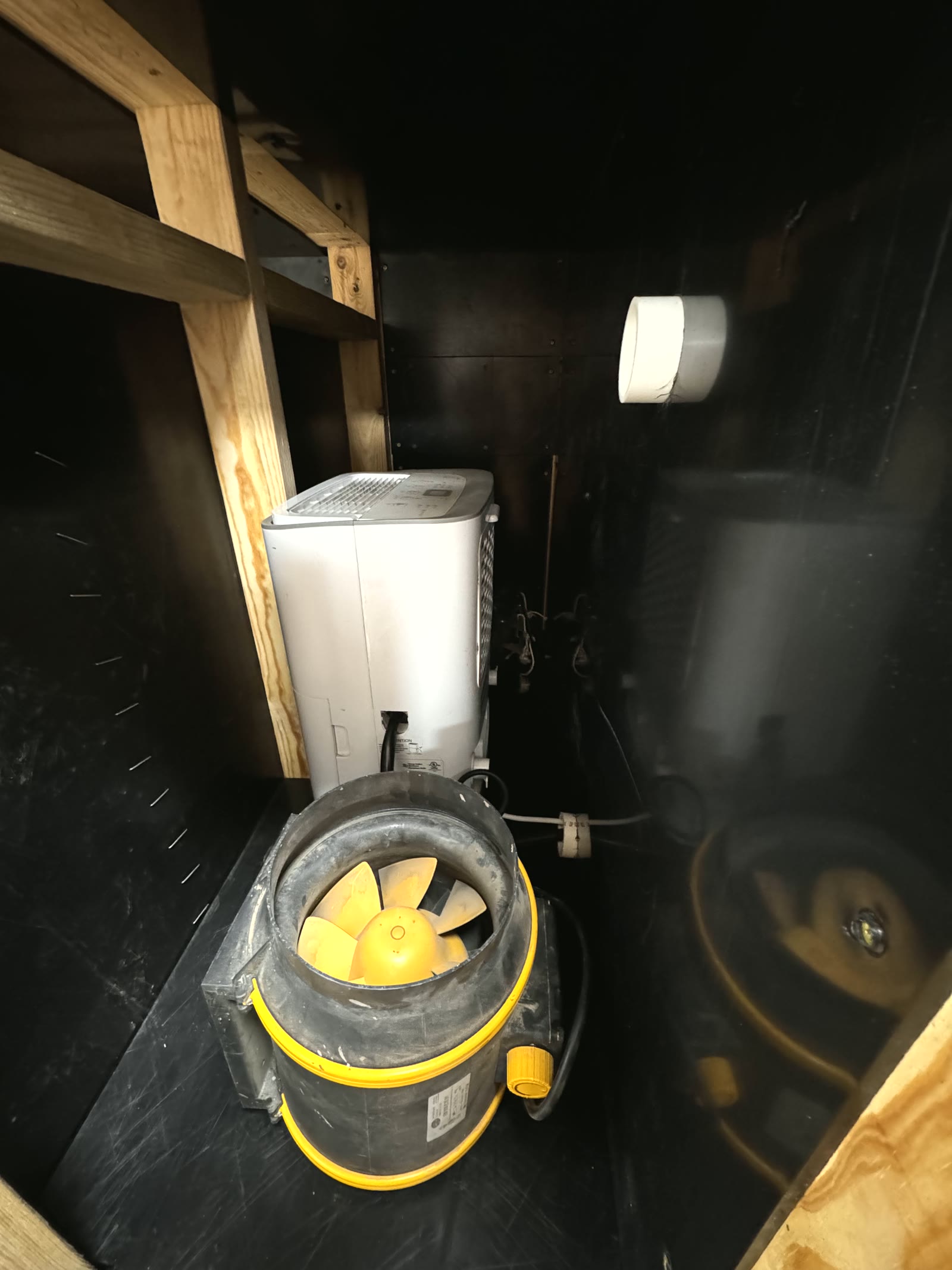 Fan and heater unit inside the Carolina Cordys dryer — slow airflow, controlled temperature rise